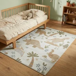 Waschbarer Kinderteppich - Mace Dino Creme