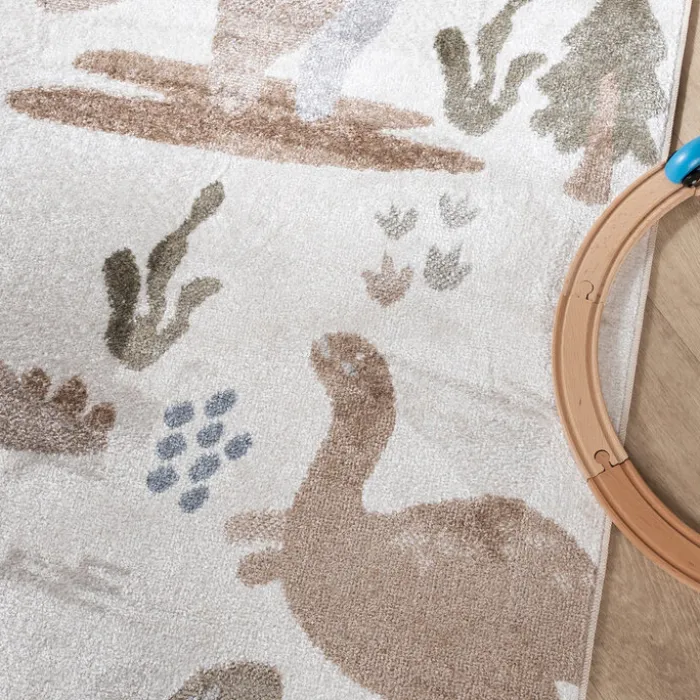 Waschbarer Kinderteppich - Mace Dino Creme